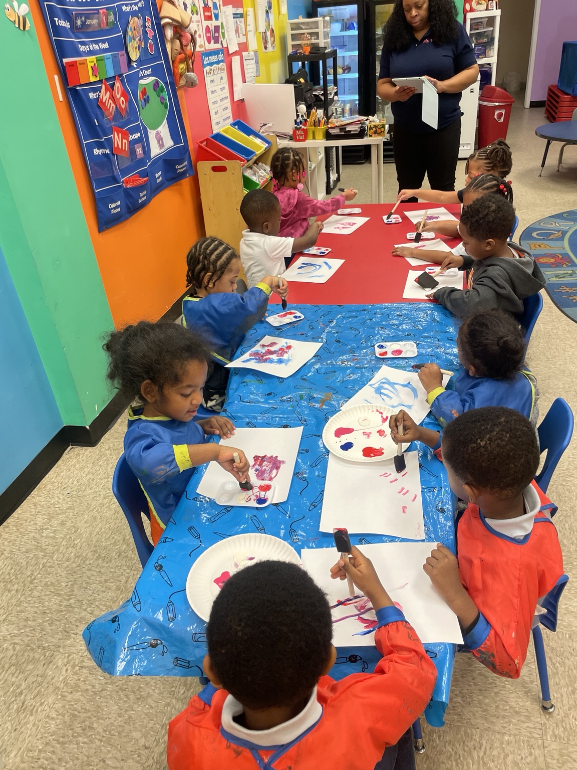 Children creating art at Moore Learning Minds